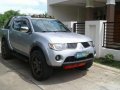 Mitsubishi Strada 4X4 GLS 2007 vs dmax pick up hilux e j g innova ls-10