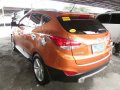 2013 Hyundai Tucson orange SUV gasoline for sale -1