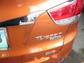 2013 Hyundai Tucson orange SUV gasoline for sale -7