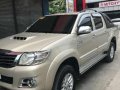 Toyota Hilux G 4x2 AT 2014 Golden For Sale-6