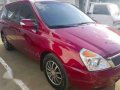 Kia Grand Carnival 2012 Red AT For Sale-1