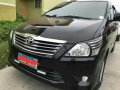 Toyota Innova 2012 Van diesel black for sale -0