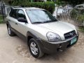 Hyundai tucson 2007 mt-10