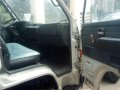 Isuzu Elf Boom truck drop side-3