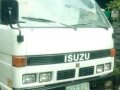 Isuzu Elf Boom truck drop side-0