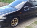 Mazda 323 familia 97-0
