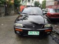 Mazda 323 1996 familia-2