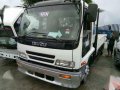 2016 Isuzu ELF Dropside 6HL 1 White MT Trucks -0