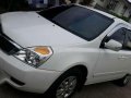 Kia Carnival 2013 2.9 MT White Van For Sale-1
