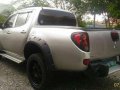 mitsubishi strada glx 2010 navara innova hilux-1