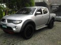 mitsubishi strada glx 2010 navara innova hilux-3