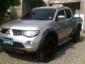 mitsubishi strada glx 2010 navara innova hilux-0