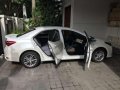 Selling my Pearl White Corolla Altis 1.6-5