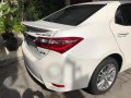 Selling my Pearl White Corolla Altis 1.6-1
