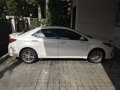Selling my Pearl White Corolla Altis 1.6-2