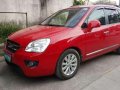 Kia Carens 2010 AT Red SUV For Sale-0