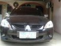 Mitsubishi Lancer GLS 2004 CVT Black -0