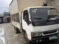 Isuzu Elf dropside with canopy-3