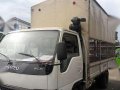 Isuzu Elf dropside with canopy-2