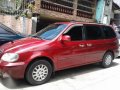 Kia Sedona 2003 AT Red Van For Sale-1