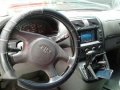 Kia Sedona 2003 AT Red Van For Sale-4