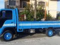 Isuzu ELF 14ft dropside flat bed truck slightly negotiable-3