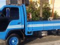 Isuzu ELF 14ft dropside flat bed truck slightly negotiable-2