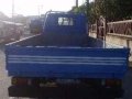 Isuzu ELF 14ft dropside flat bed truck slightly negotiable-0