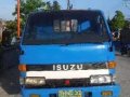 Isuzu ELF 14ft dropside flat bed truck slightly negotiable-1
