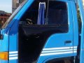 Isuzu ELF 14ft dropside flat bed truck slightly negotiable-4