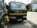 Isuzu elf dropside giga 14ft Nkr 6wheeler no truckban new tires-3