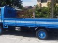 Isuzu ELF 14ft dropside flat bed truck slightly negotiable-7
