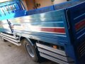 Isuzu Elf Dropside GIGA WIDE-4