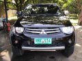 2013 Mitsubishi Strada GLS V 4x4 MT Black -2