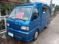 Multicab Suzuki passenger type blue and Pink and Nissan urvan Estate-1
