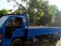 Isuzu Elf Dropside-2