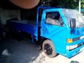 Isuzu Elf Dropside-8