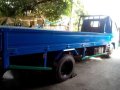 Isuzu Elf Dropside-5