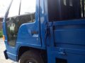 Isuzu Elf Dropside-7