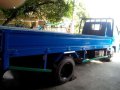 Isuzu Elf Dropside-6