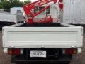 surplus japan isuzu elf dropside with mini crane-1