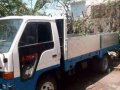 isuzu elf dropside and boomtruck-1