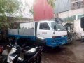 isuzu elf dropside and boomtruck-2