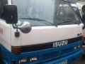 isuzu elf dropside and boomtruck-0