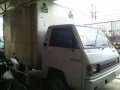 2003 Mitsubishi L300 Aluminum Van MT White -0