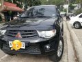 2014 Mitsubishi Strada GLX 4x2 MT Black For Sale-0