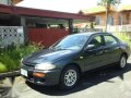 Mazda 323 Glxi Rayvan 1997 MT Black For Sale-1