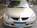 Mitsubishi Lancer 2004 Beige color for sale-0