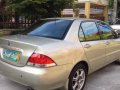 Mitsubishi Lancer 2004 Beige color for sale-3