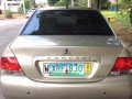 Mitsubishi Lancer 2004 Beige color for sale-2